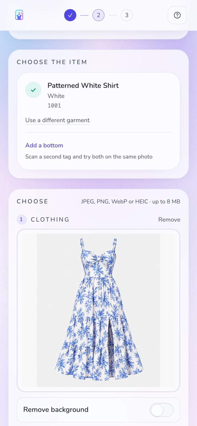 StyleFrame studio on a phone with an isolated blue-and-white floral dress loaded in the garment photo area